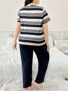 Set de 2 piezas de pijama con Top de manga corta con estampado de bloques de color y rayas y pantalón largo para tallas grandes