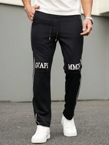 Manfinity Homme Calça de Moletom Casual Reta, Solta, com Estampa de Letras, Cordão de Ajuste na Cintura e Bolso com Zíper para Homens - Preto - Visão 4