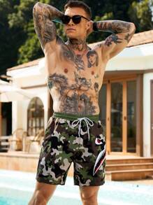 Manfinity Swimmode Pantalón corto casual de playa para hombres, minimalista y de moda para uso diario, hawaiano