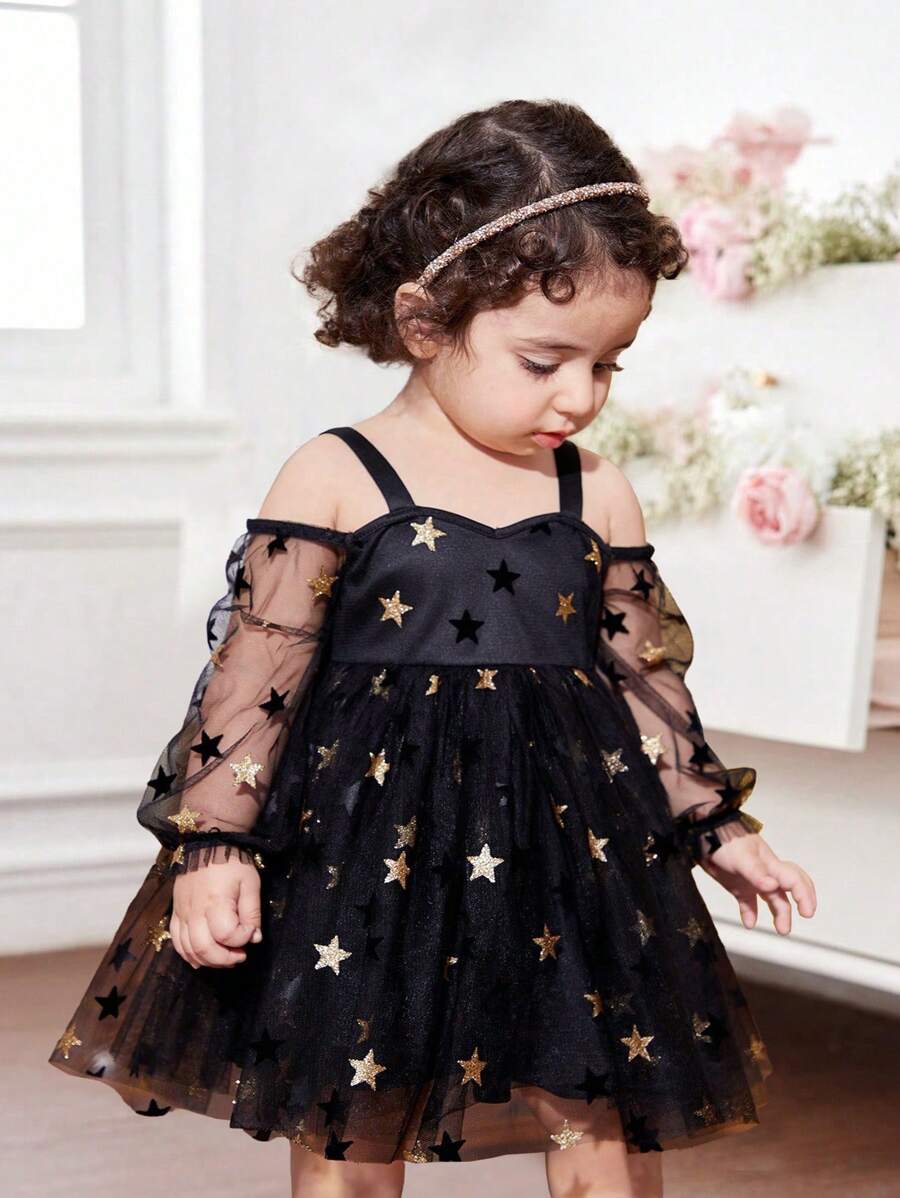 SHEIN Babygirl 圣诞优雅连衣裙，黑色网眼星星装饰无袖和长袖连衣裙，适合派对、聚会、生日 - 黑色 - 查看 1