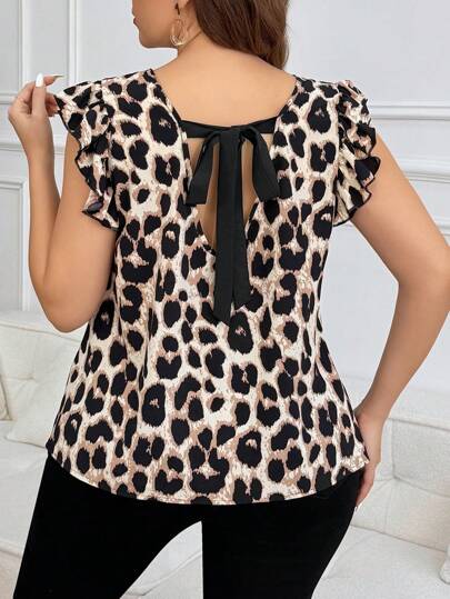 SHEIN Frenchy Blusa de talla grande para mujer con estampado de leopardo, diseño de lazo en la espalda y contraste de colores, de corte entallado y de moda