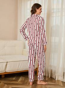 SHEIN Conjunto de pijama de 2 piezas con pantalones holgados y cómodos con estampado de rayas rojas y blancas y letra, y top de manga larga para mujer