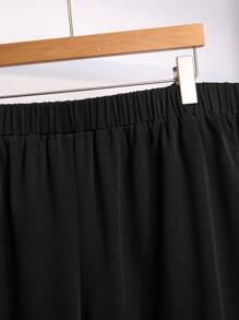 SHEIN LUNE Plus Size Women Casual Loose Decorative Button Pendant Capri Pants, Versatile Commuter Style - Black - View 7