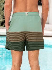 Manfinity Swimmode Shorts de playa casuales de hombre a rayas con cordón en la cintura
