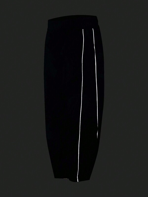 SHEIN Boys' Sports Reflective Black Color Block Loose Woven Athletic Pants, Suitable For Sports & Casual Wear