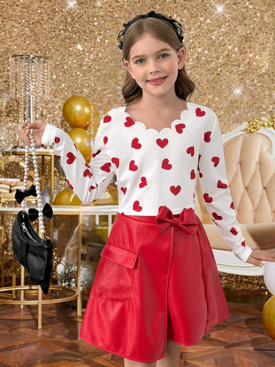 Jupe mini froncée noire unie à découpes, idéale pour les sorties et événements, élégante et polyvalente, pour jeune fille au début du printemps. Assortie à un t-shirt moulant imprimé cœur avec décoration nœud papillon et jupe droite  rouge. Ensemble chic de 2 pièces pour les fêtes et les réunions - Rouge - Voir 1