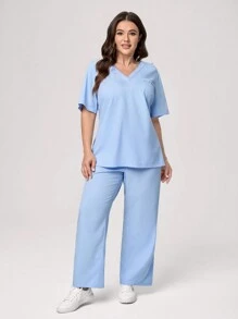TaskEZ Plus Size Women Solid Color Loose Short Sleeve Blouse With Pocket And High Waist Straight Leg Pants Scrub Uniform Set - Baby Blue - View 3
