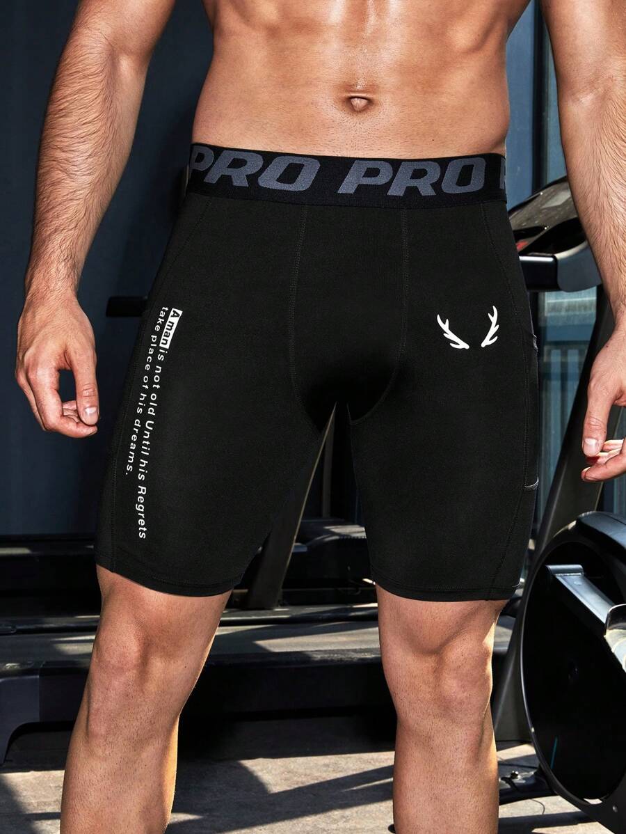 Manfinity Fitness Men's Slogan Print Athletic Compression Shorts