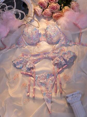 3-delat set: Broderad fjäderdekorerad bygel-bh, strumpebandshållare och stringtrosa för uteservering