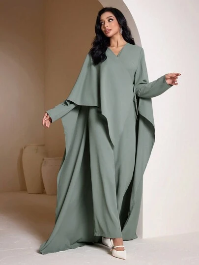 Veilorie جمبسوت أنيقة للنساء سادة اللون بياقة على شكل V وأكمام على شكل خفاش