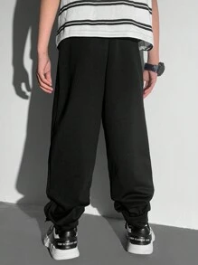 SHEIN Minimalistische mode casual trainingsbroek met rits voor jongens, dagelijkse kleding