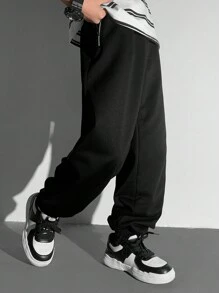 SHEIN Minimalistische mode casual trainingsbroek met rits voor jongens, dagelijkse kleding