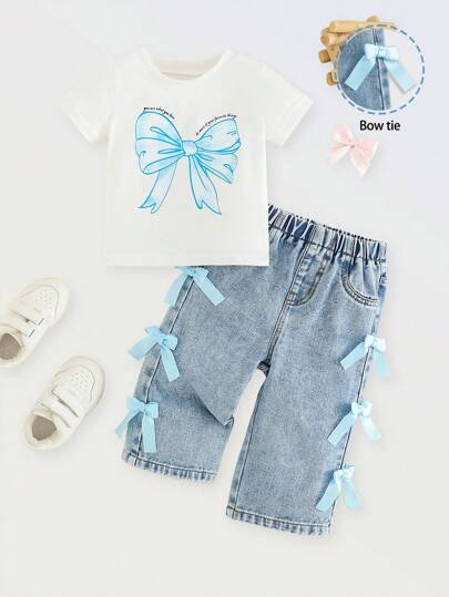 SHEIN Denimly 2 件套女婴休闲装：柔软白色圆领短袖 T 恤，渐变色蝴蝶结印花，蓝色牛仔裤，手工缝制蝴蝶结装饰，松紧腰带