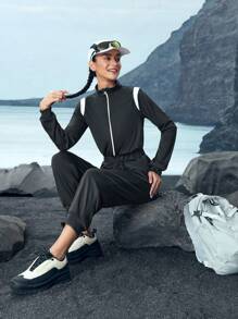 In My Nature Women's Solid Color Patchwork Front Zipper Long Sleeve Casual Jumpsuit - Black and White - View 4