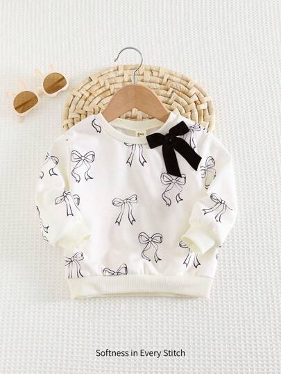 Cozy Pixies 女宝宝柔软针织圆领长袖上衣，配超大蝴蝶结装饰