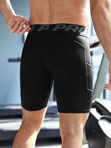 Manfinity Fitness Men's Slogan Print Athletic Compression Shorts