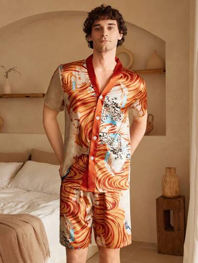 Manfinity ChillVibe Conjunto de ropa de estar en casa de hombre con camisa de manga corta con botones delanteros y estampado minimalista, y pantalones cortos