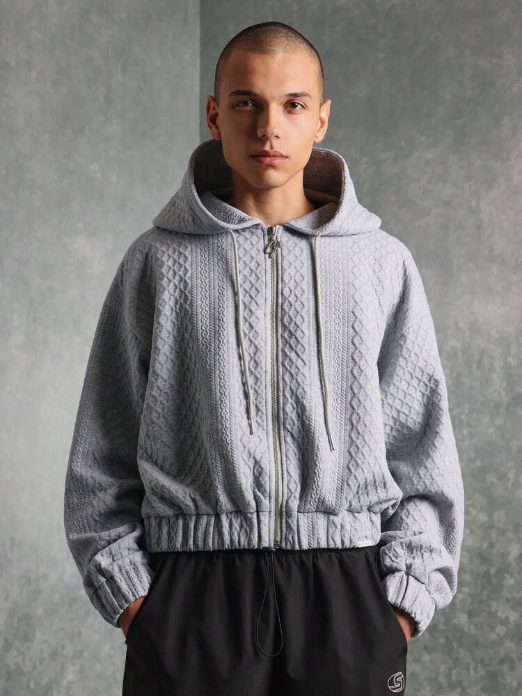 Gesteppter, kurzer, strukturierter Kapuzenpullover mit Zopfmuster und Reißverschluss