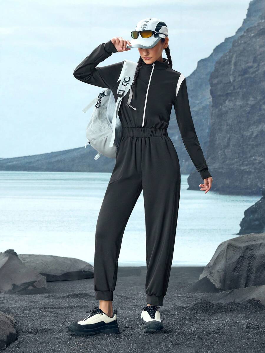 In My Nature Women's Solid Color Patchwork Front Zipper Long Sleeve Casual Jumpsuit - Black and White - View 1