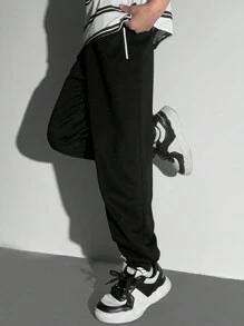 SHEIN Minimalistische mode casual trainingsbroek met rits voor jongens, dagelijkse kleding