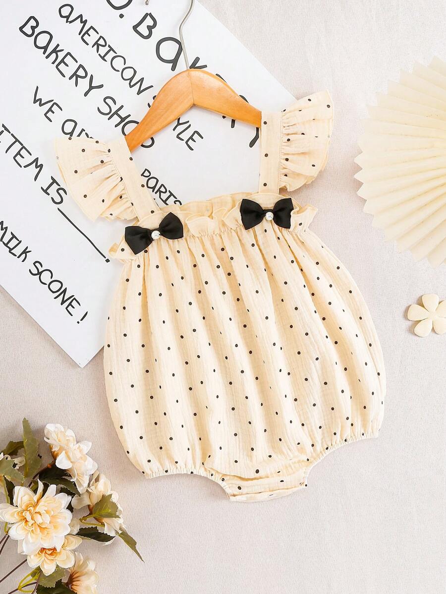 Souflis Souflis Mono de bebé de verano con estampado de lunares negros, perlas negras y mariposa, diseño simple y lindo - Blanco - Ver 1