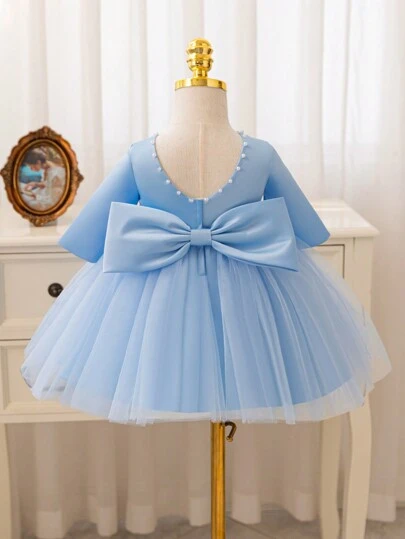 SHEIN Glamorique Kids Vit julprinsessklänning för flickor, satin & mesh lapptäcke Långärmad V-ringad pärldekor Bowknot backbollklänning, lämplig för fester, höst/vinter