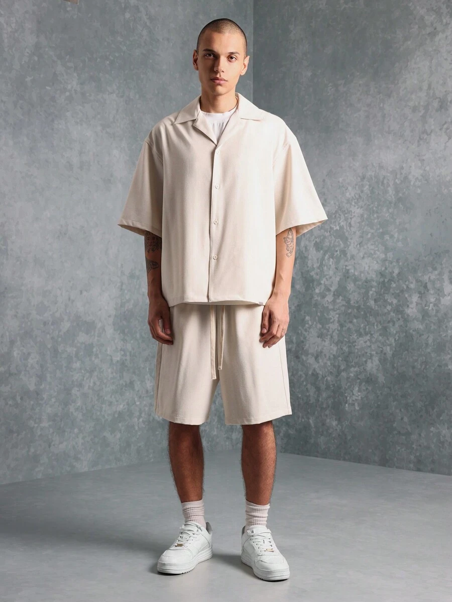 SUMWON Luxury Resort Wear Boxy Fit Revere Collar Short Sleeve Button Down Shirt Set With Matching Shorts Summer Beach Vacation Lounge Wear Casual Two-Piece Coordinated Outfit - Apricot - View 1