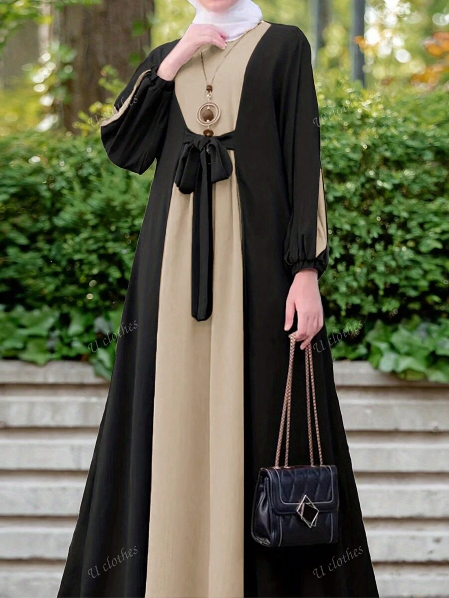 Nuovo vestito casual con collo rotondo, colore a blocchi nella parte anteriore, cinghia centrale, polsini elastici, maniche lunghe, stile a trapezio, modesto