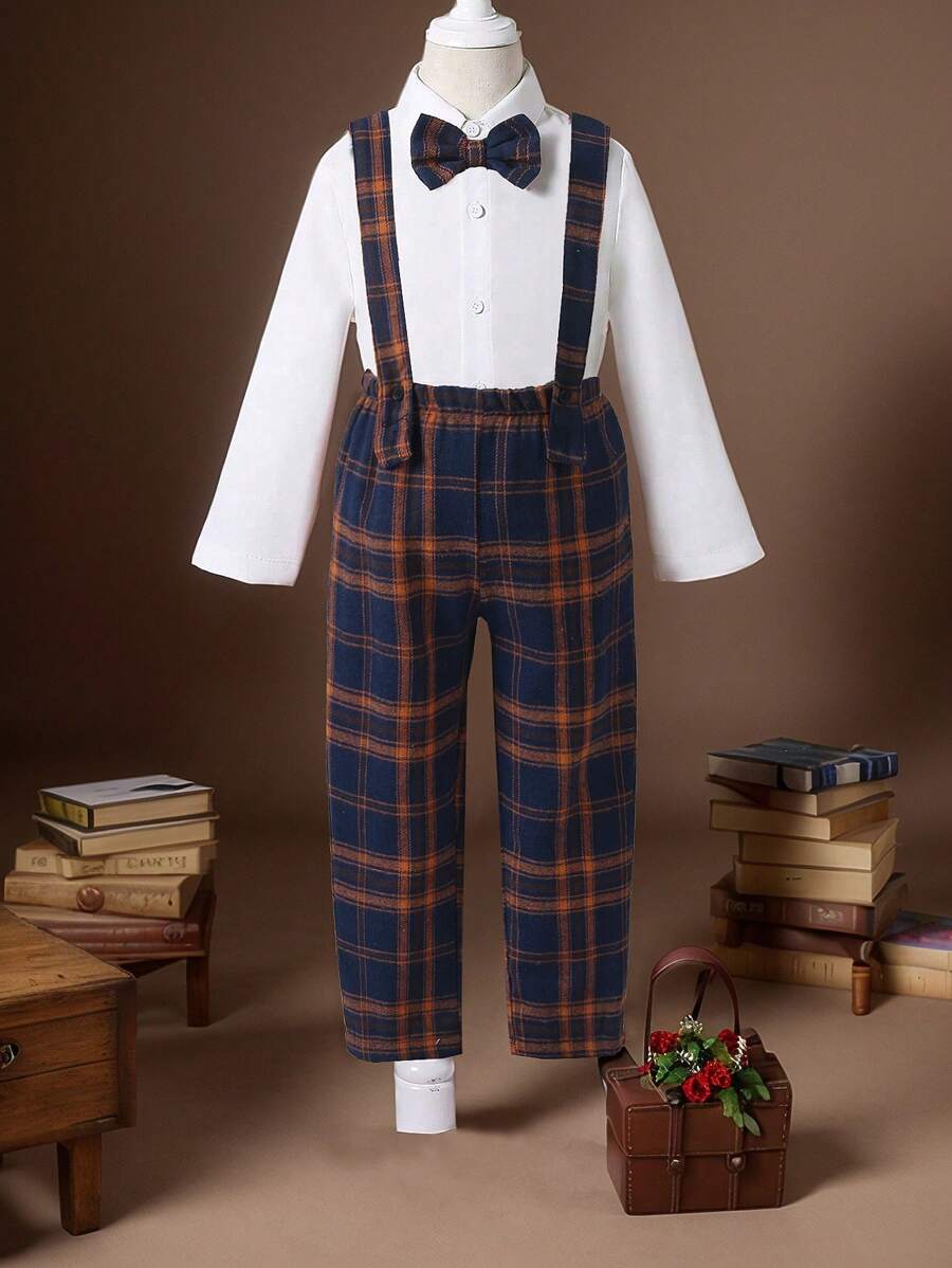 SHEIN 年轻男孩 2 件套正式服装,长袖衬衫 + 长裤,圣诞红绿条纹格子图案,经典百搭拉绒格子裤,宽松版型,白色编织长袖衬衫搭配格子领结,配套吊带裤细节,适合派对、聚会、外出就餐和日常穿着,可爱优雅的风格 - 彩色 - 查看 1