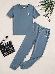 SHEIN Tween-Jungen 2-teiliges schlichtes, lässiges Pyjama-Set mit kurzärmligem Oberteil und Leggings mit Buchstabenmuster