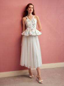 MOTF PREMIUM TOP Z PEPLUM I NADRUKIEM W KWIATOWE KOLORY BEZ RĘKAWÓW