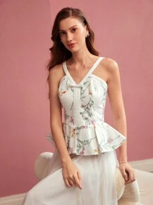 MOTF PREMIUM TOP Z PEPLUM I NADRUKIEM W KWIATOWE KOLORY BEZ RĘKAWÓW