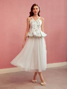 MOTF PREMIUM TOP Z PEPLUM I NADRUKIEM W KWIATOWE KOLORY BEZ RĘKAWÓW
