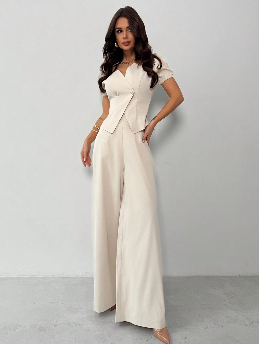 Firerie Festiwalowa nowość Biurowa damska dojazdowa elegancka bufiasta koszula z asymetrycznym otwartym przodem zapinana na metalowe guziki i szerokie nogawki do kostek wyszczuplające wysokie morelowe spodnie - Morela - Zobacz 1