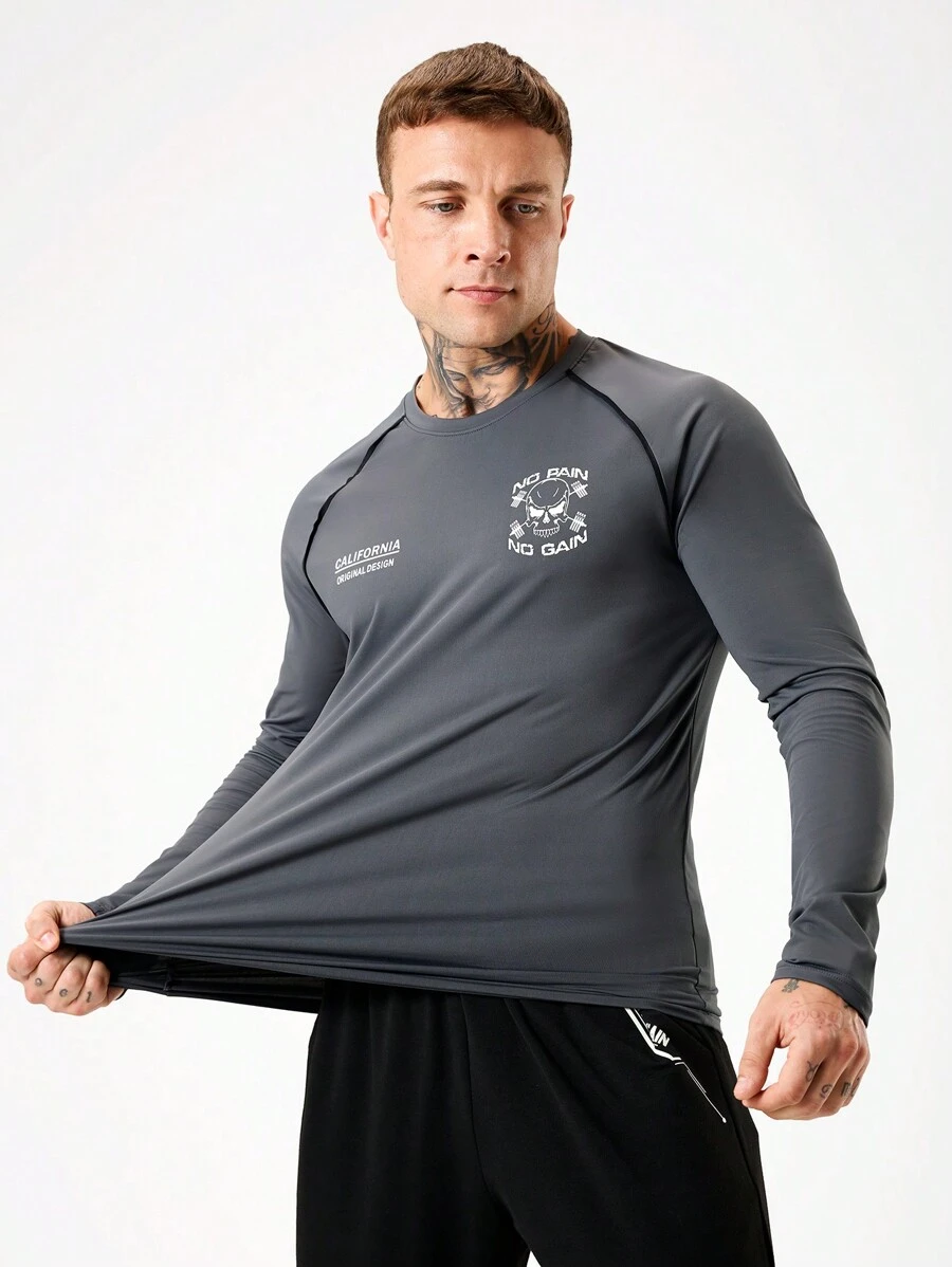 Manfinity Sport Corelite Herren Lässig Fitness & Sport T-Shirt mit rundem Ausschnitt, Raglanärmeln und Buchstaben-Muster, Langarm