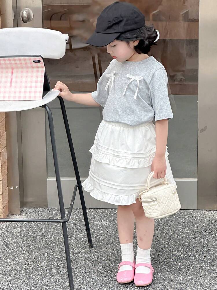 Young Girl Bow Decor Round Neck Short Sleeve T-Shirt And Ruffled Hem Skirt 2 Pieces Set, Cute,Girls Summer Outfits