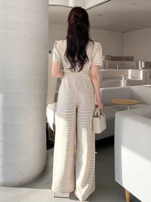 DAZY Combinaison-pantalon élégante à manches bouffantes, décor de poche et jambes larges pour femmes