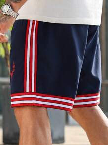 Manfinity Homme Pantalones cortos casuales holgados con bolsillo, cordón de ajuste en la cintura para hombres talla grande con rayas