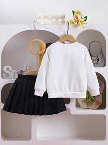 SHEIN Elladie kids 2 件套年轻女孩休闲可爱针织运动衫套装，长袖蝴蝶结上衣和黑色百褶裙，适合秋季假期和日常穿着 - 白色 - 查看 2