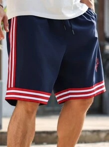Manfinity Homme Pantalones cortos casuales holgados con bolsillo, cordón de ajuste en la cintura para hombres talla grande con rayas