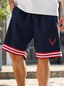 Manfinity Homme Pantalones cortos casuales holgados con bolsillo, cordón de ajuste en la cintura para hombres talla grande con rayas
