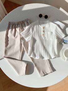 SHEIN Leap Crew 2-Piece Set Of Young Boy Casual Sportswear, Featuring A Vintage, Artistic, Retro, Textured Fabric, Includes A Half-Sleeve Stand-Up Collar T-Shirt And Long Pants Set, Suitable For Back To School,Birthday Parties, Evening Events, Performances - White - View 5