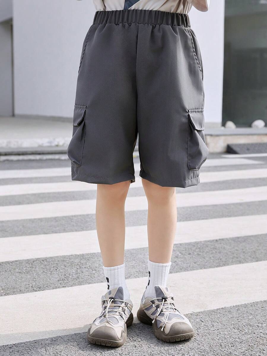 SHEIN Tween Boy Casual Solid Color Elastic Waist Cargo Pocket Loose Shorts, Suitable For Daily Outings, Shopping, Walking, Gatherings, Campus, Community Activities, Shopping Trips And More
