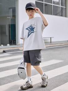 SHEIN Tween Boy Casual Solid Color Elastic Waist Cargo Pocket Loose Shorts, Suitable For Daily Outings, Shopping, Walking, Gatherings, Campus, Community Activities, Shopping Trips And More