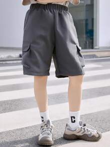 SHEIN Tween Boy Casual Solid Color Elastic Waist Cargo Pocket Loose Shorts, Suitable For Daily Outings, Shopping, Walking, Gatherings, Campus, Community Activities, Shopping Trips And More