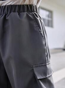 SHEIN Tween Boy Casual Solid Color Elastic Waist Cargo Pocket Loose Shorts, Suitable For Daily Outings, Shopping, Walking, Gatherings, Campus, Community Activities, Shopping Trips And More