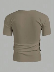 Manfinity Homme Camiseta casual de manga corta con cuello en V de color liso para hombre