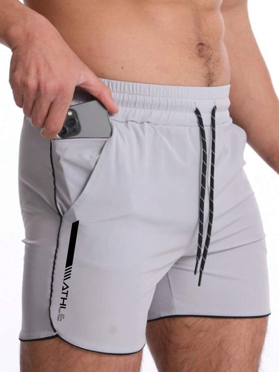 Manfinity Sport Corelite Shorts casuales de hombre con cordón, bolsillo e impresión, shorts grises - Gris - Ver 1