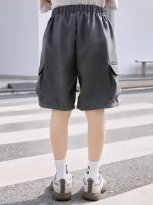 SHEIN Tween Boy Casual Solid Color Elastic Waist Cargo Pocket Loose Shorts, Suitable For Daily Outings, Shopping, Walking, Gatherings, Campus, Community Activities, Shopping Trips And More