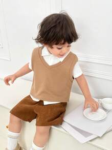 SHEIN Set da 3 pezzi per bambino/a, camicia casual bianca a maniche corte, stile scuola con collo alla coreana, gilet smanicato di colore unico, pantaloncini con elastico in vita, adatto per scuola, casa, uscite, stile coreano, per primavera/estate
